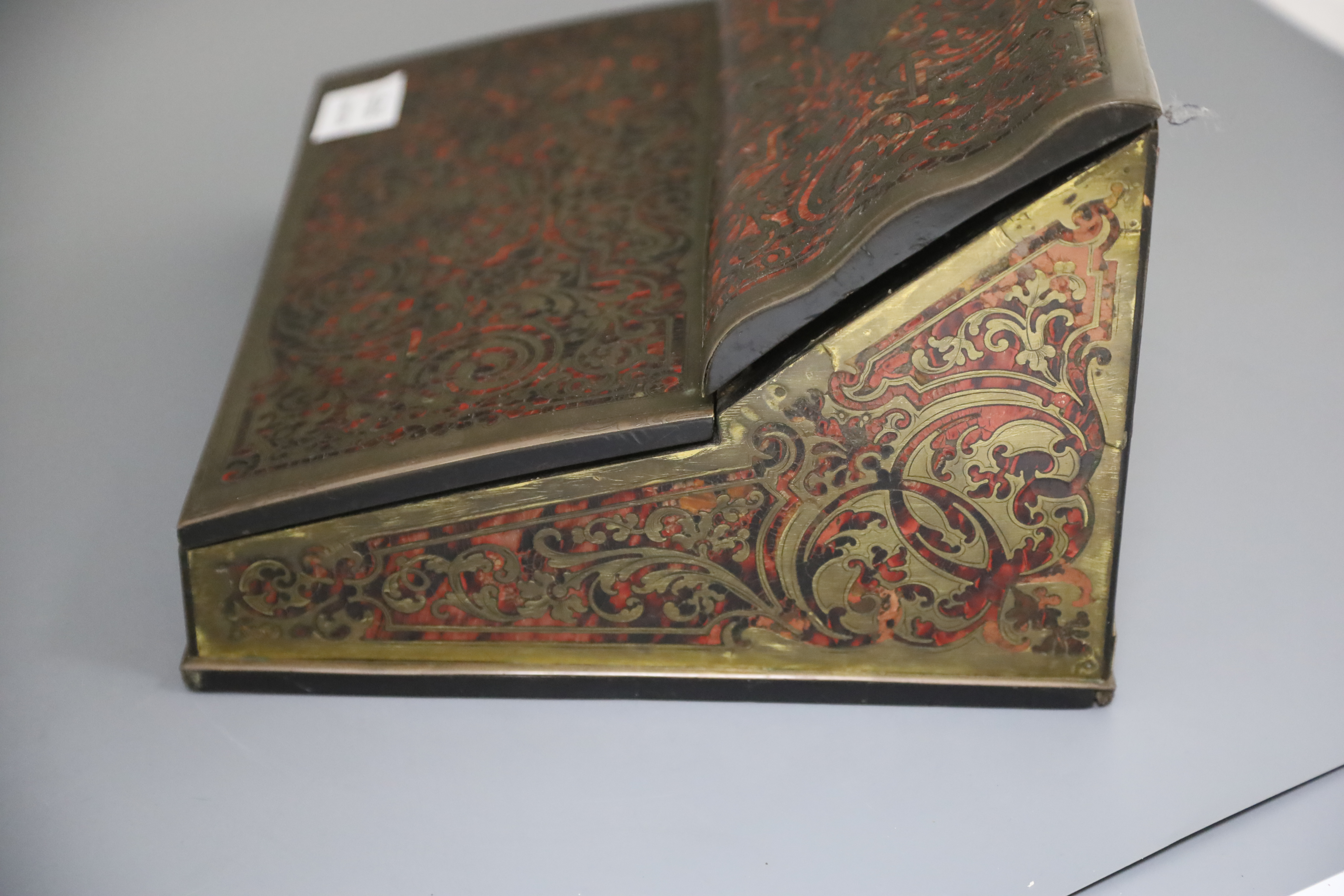 An early 20th century French red boulle work lap desk, width 13in. depth 11.5in. height 8in.